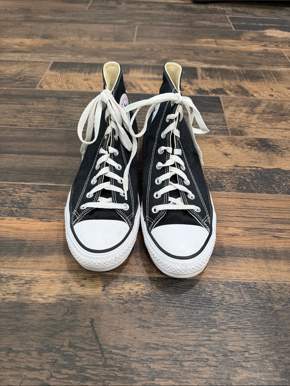 Classic Black High-Top Converse Chuck Taylor  Sneakers with White Accents